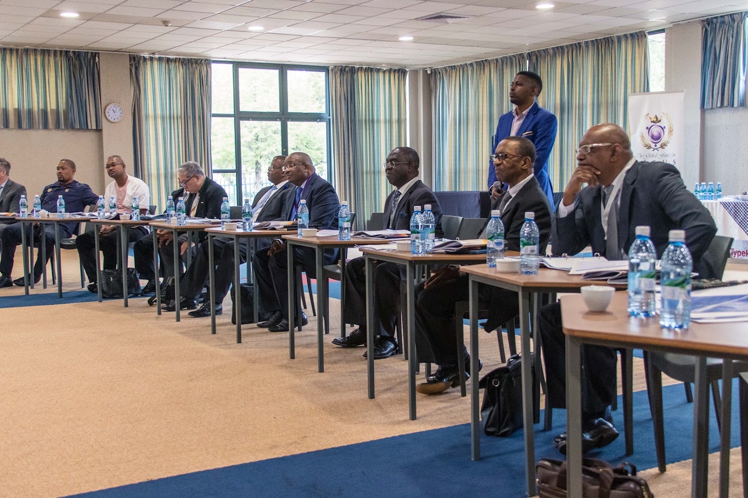 Business leaders seated at tables during a GBR meeting